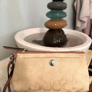 Coach Tan and Yellow Wristlet with Signature Design